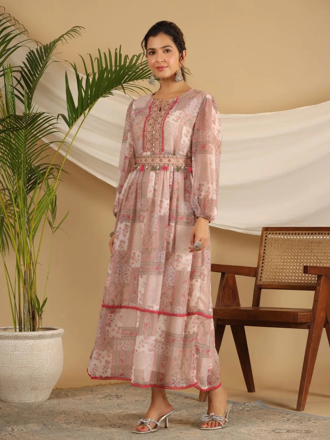 Jashvi Beige Chiffon Ethnic Motif Printed Fit & Flare Maxi Dress With Embroidered Belt Kaudis & Tassels