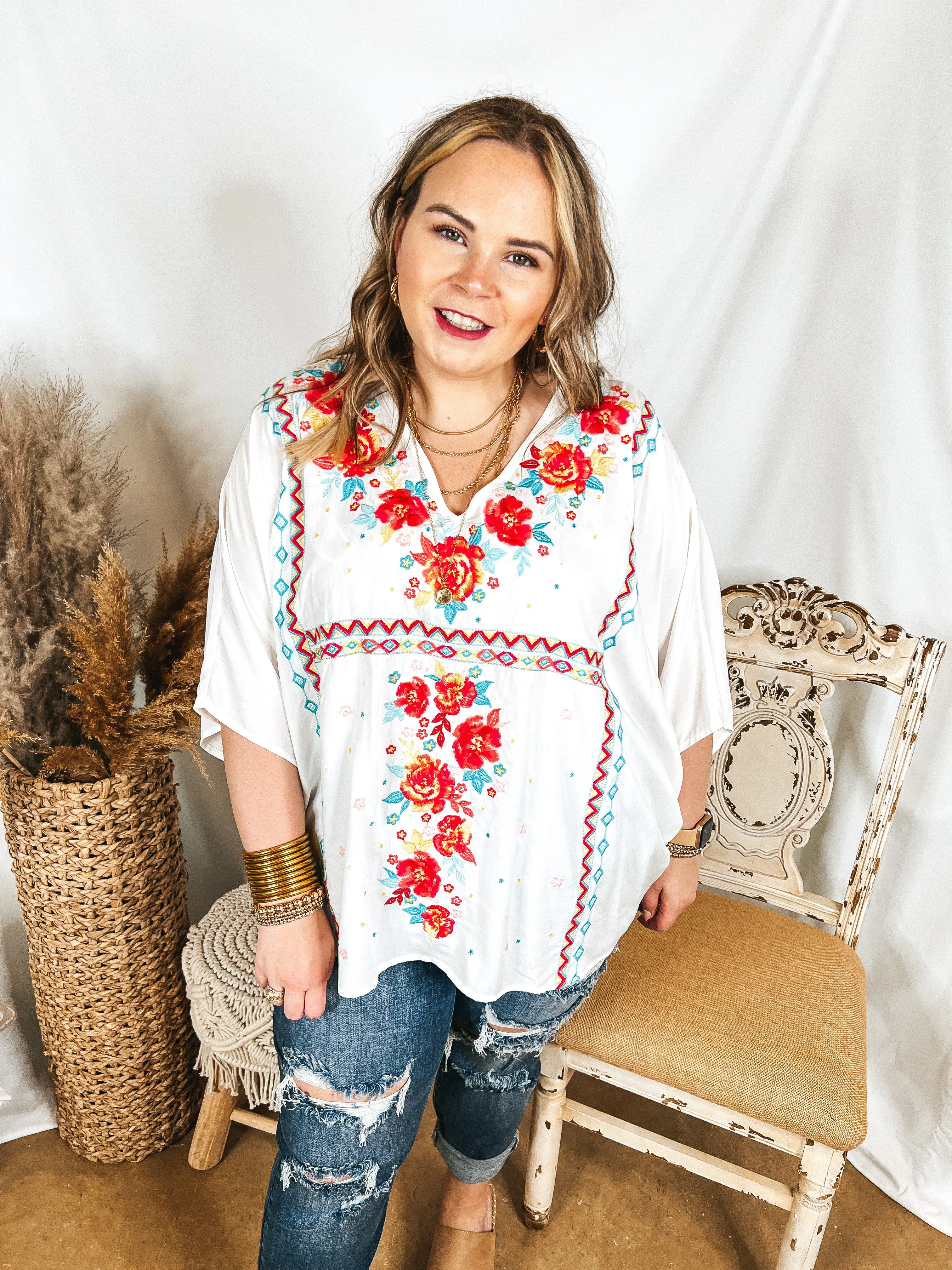 More To The Story Floral Embroidered Poncho Top in White