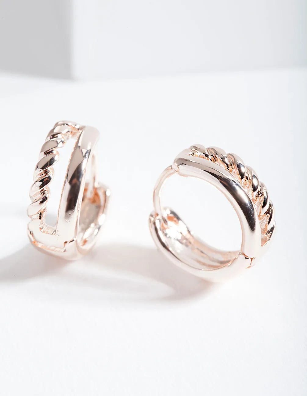 Rose Gold Twisted Huggie Hoop Earrings